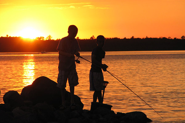 Kids enjoy sunset fishing at Northern Minnesota fishing resorts